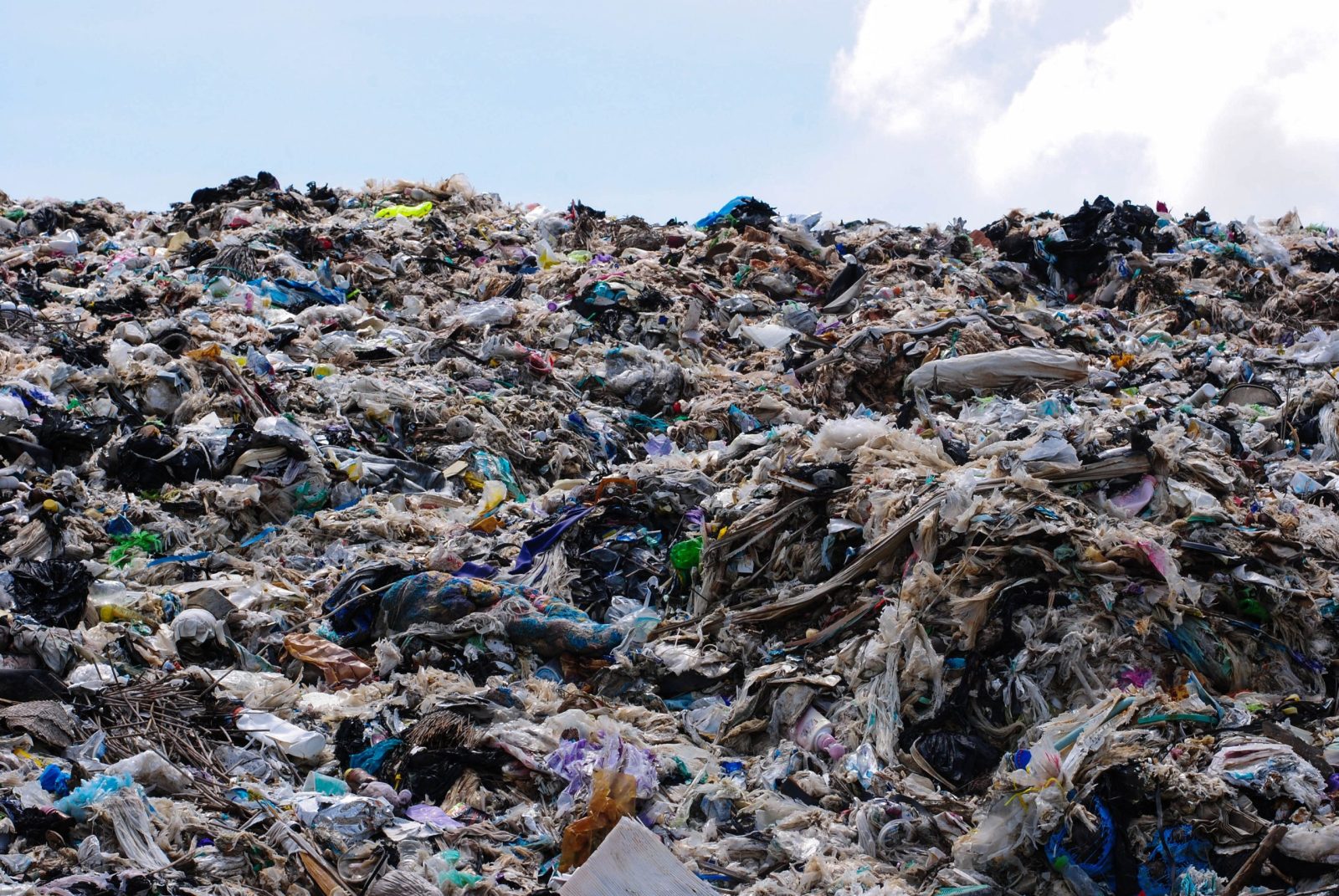 shutterstock_2148853853-scaled-e1676601289596.jpgfit16002C1071ssl1 EU Dumps 37 Million Items of Plastic Clothing in Kenya Annually. This Country is the Top Offender.